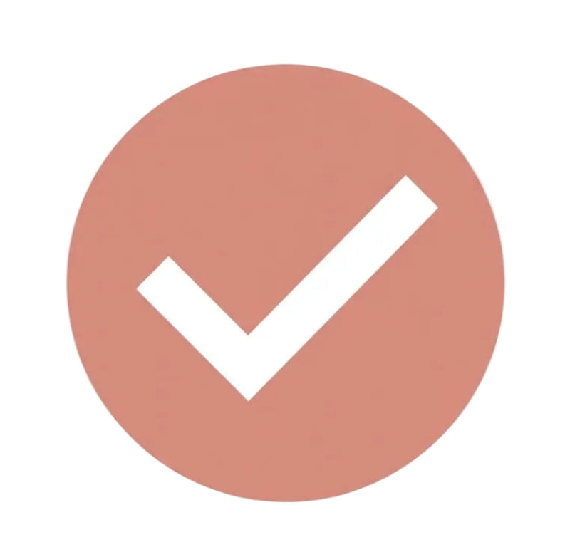A minimalist graphic icon featuring a white checkmark inside a muted dusty rose circle, centered on a solid white background.